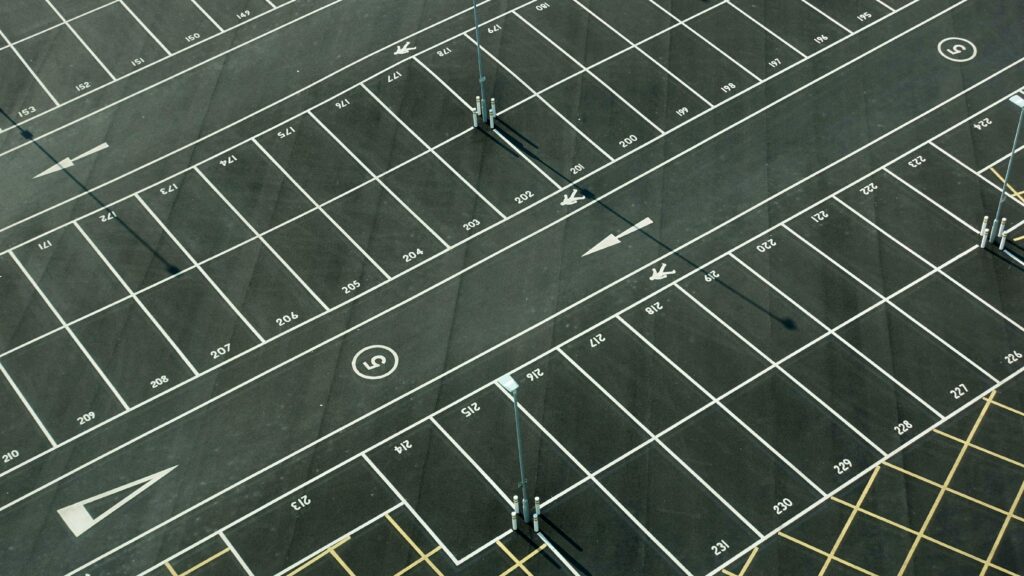 Aerial View of Asphalt Parking Lot Area
