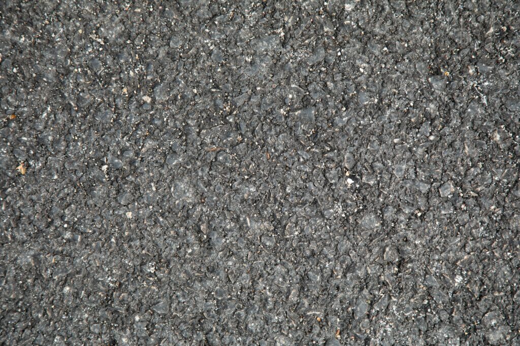 Close up of asphalt reflecting our asphalt repair Colorado Springs services.