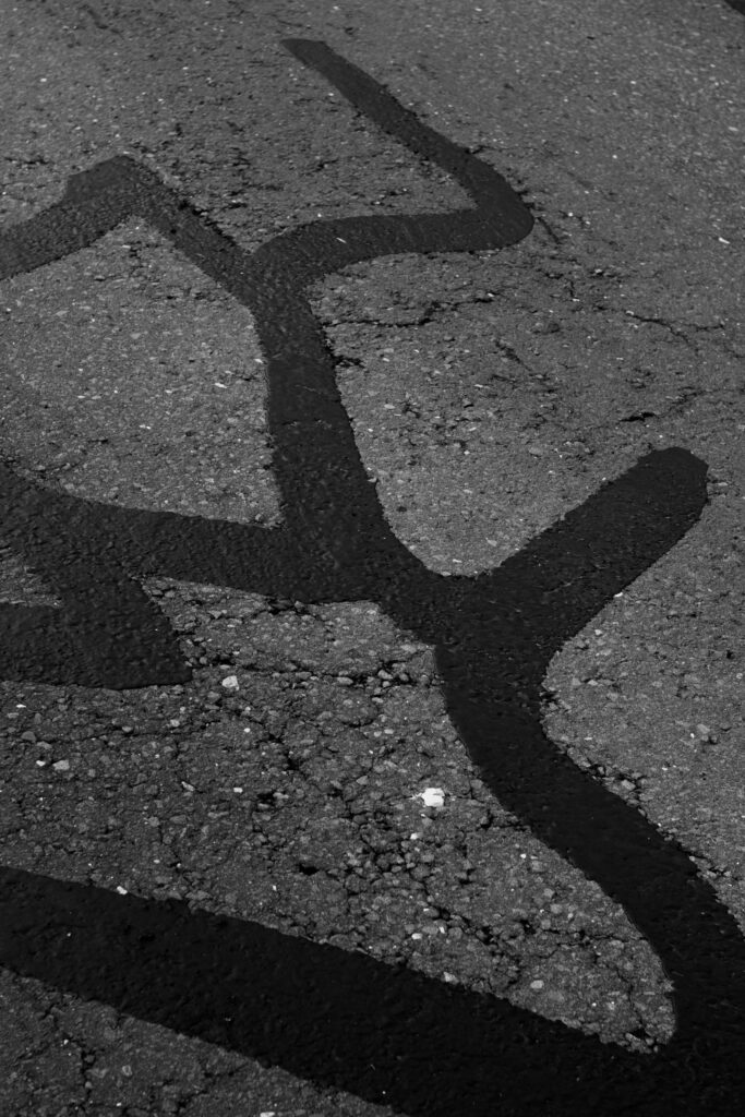 Bitumen on Asphalt Surface reflecting our sealing asphalt driveway services.